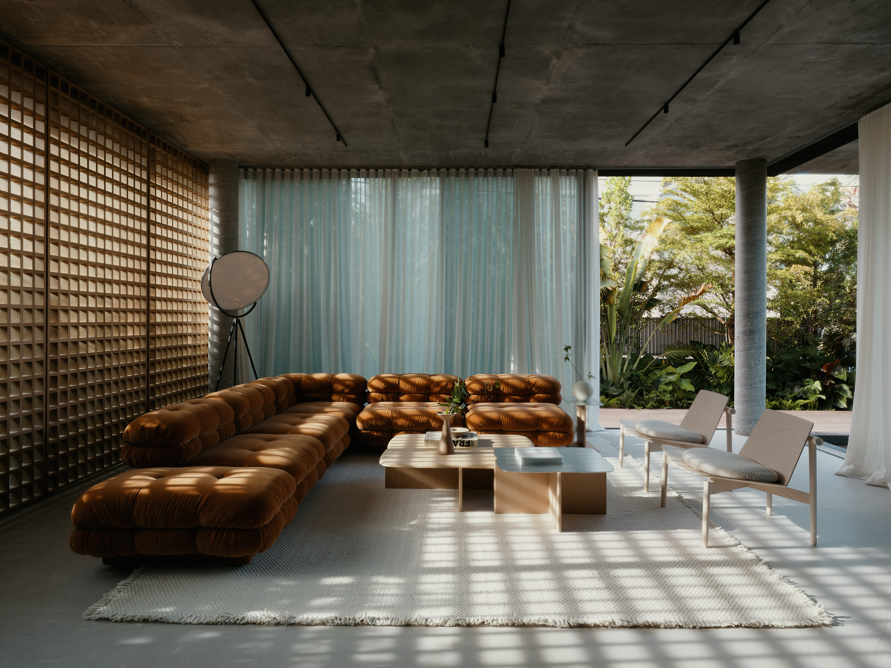 Miami house by studiokp2, a minimalist concrete building with clean surfaces and monumental volumes