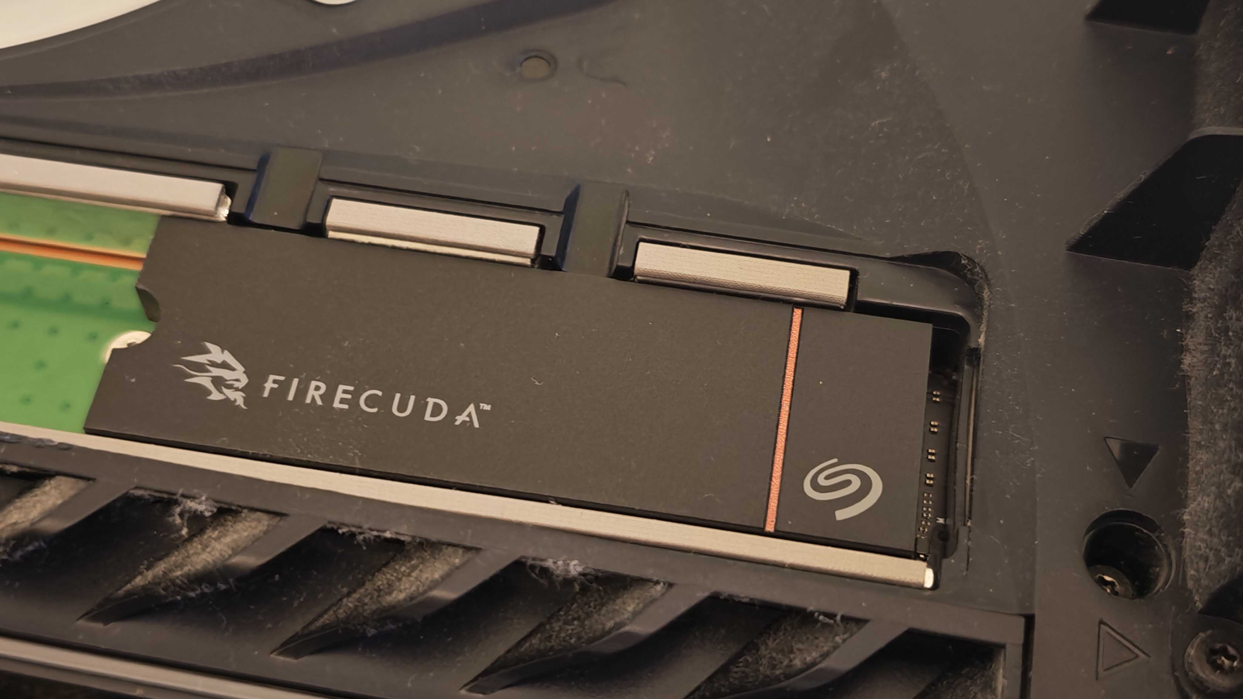 The Seagate FireCuda 530R with heatsink on a colorful fabric desk mat.