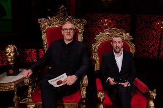 The Taskmaster season 15 Greg Davies and his assistant Alex Horne sitting in their throne-like chairs in the Taskmaster studio