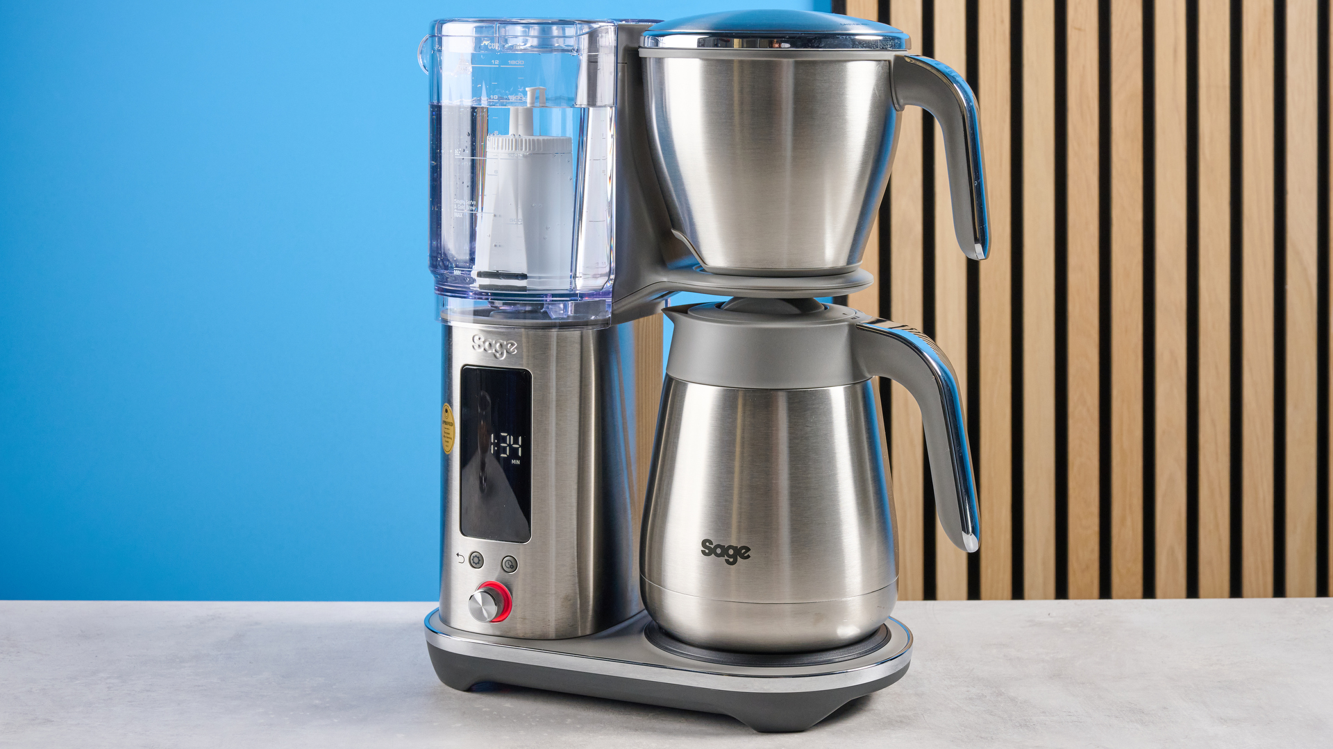 the breville luxe brewer (sage luxe brewer in the UK) thermal carafe version with a silver metal carafe and filter basket and removable plastic water tank showing the range of filter baskets and paper filters with a dial to control brew