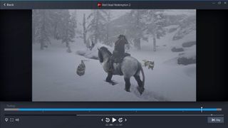 Arthur Morgan battling wolves in the snow in Red Dead Redemption 2 with the Steam Game Recorder overlay.