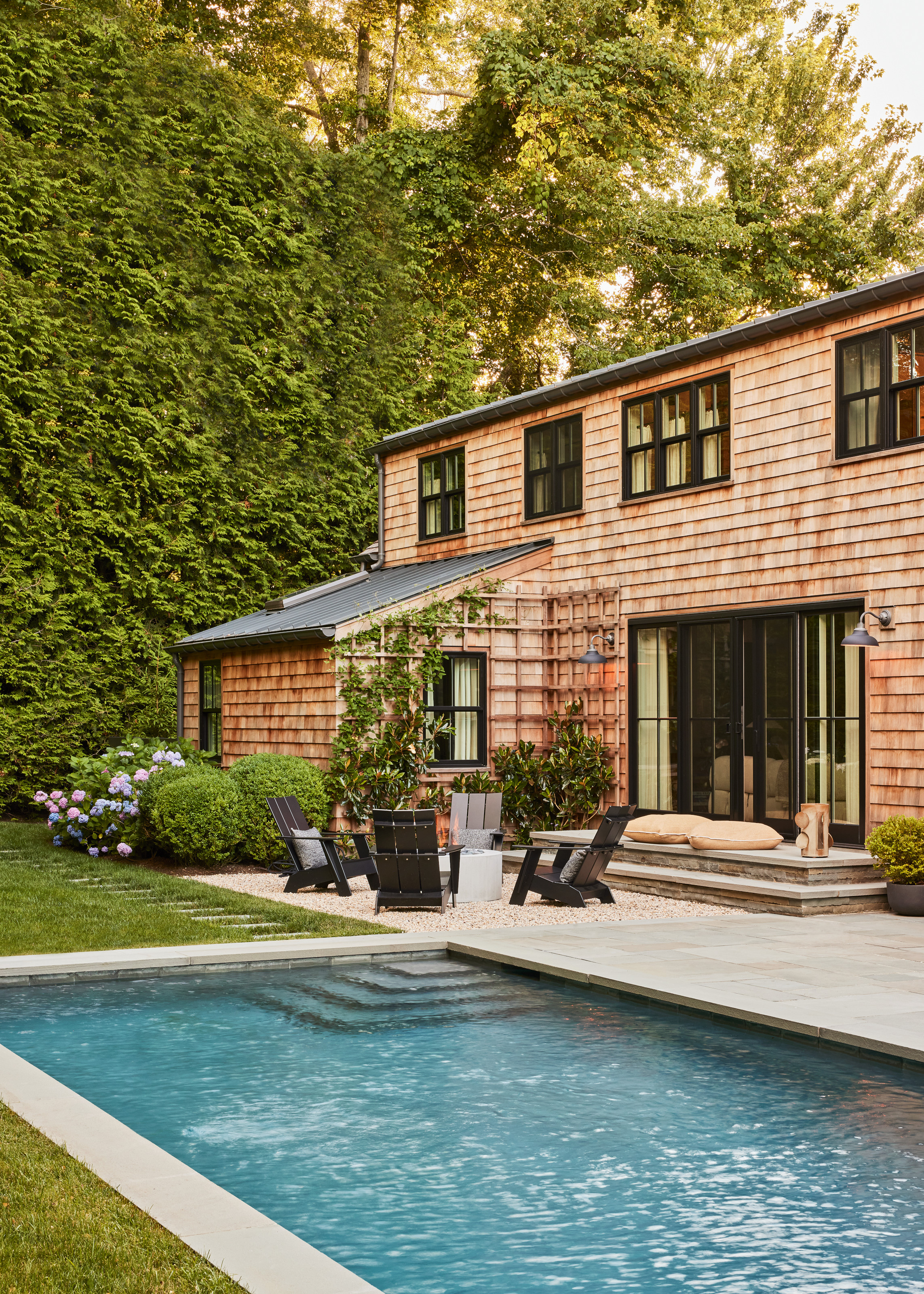 Outside of house with swimming pool and outdoor furniture