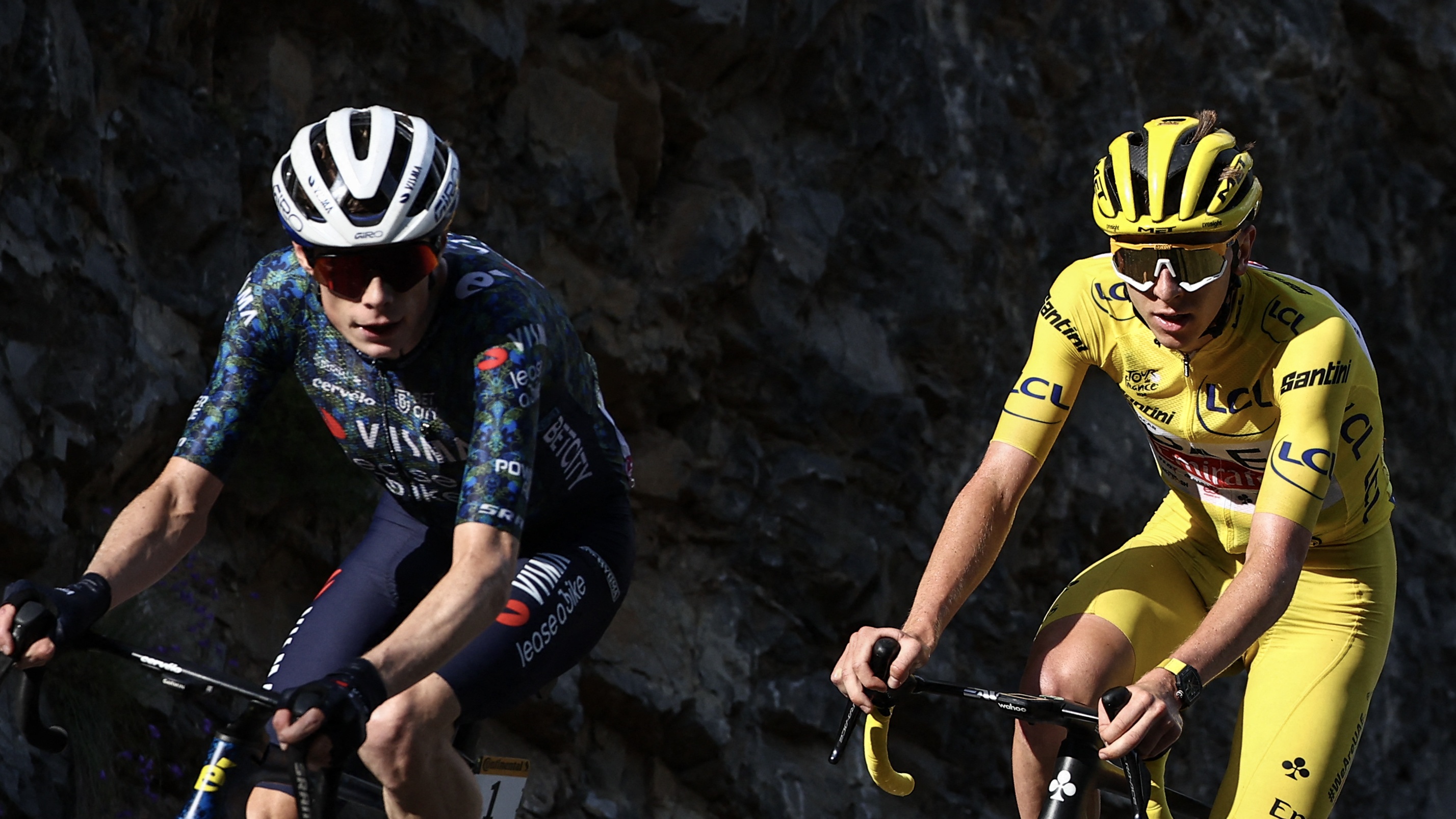 Jonas Vingegaard and Tadej Pogacar battling in 2024 Tour de France.