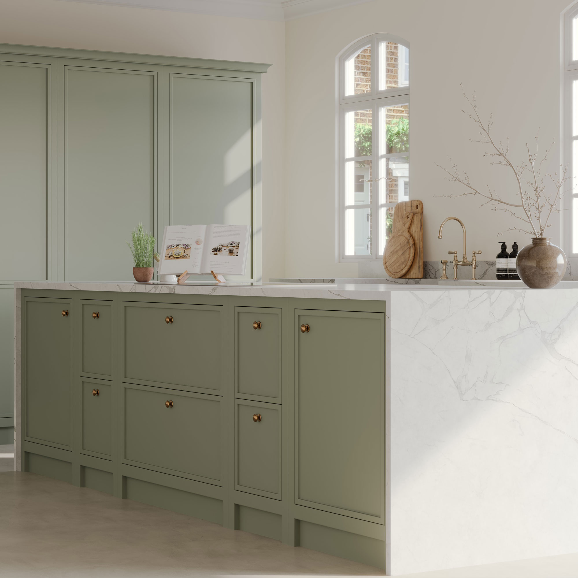 pale green slim Shaker kitchen with marble waterfall island