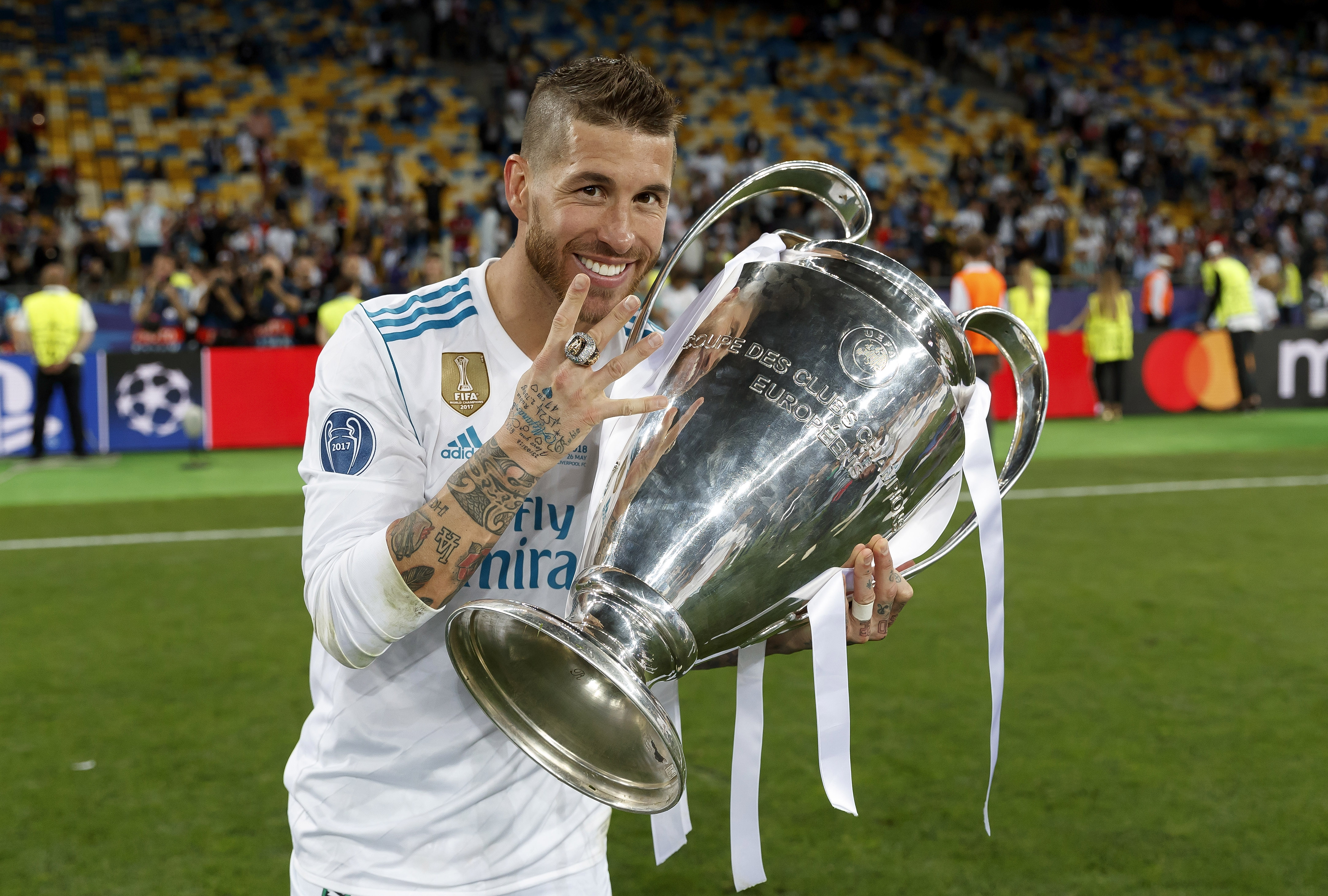 Sergio Ramos celebrates with the Champions League trophy after Real Madrid's win over Liverpool in the 2018 final in Kyiv.