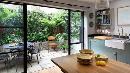 courtyard with antique vintage outdoor dining table 