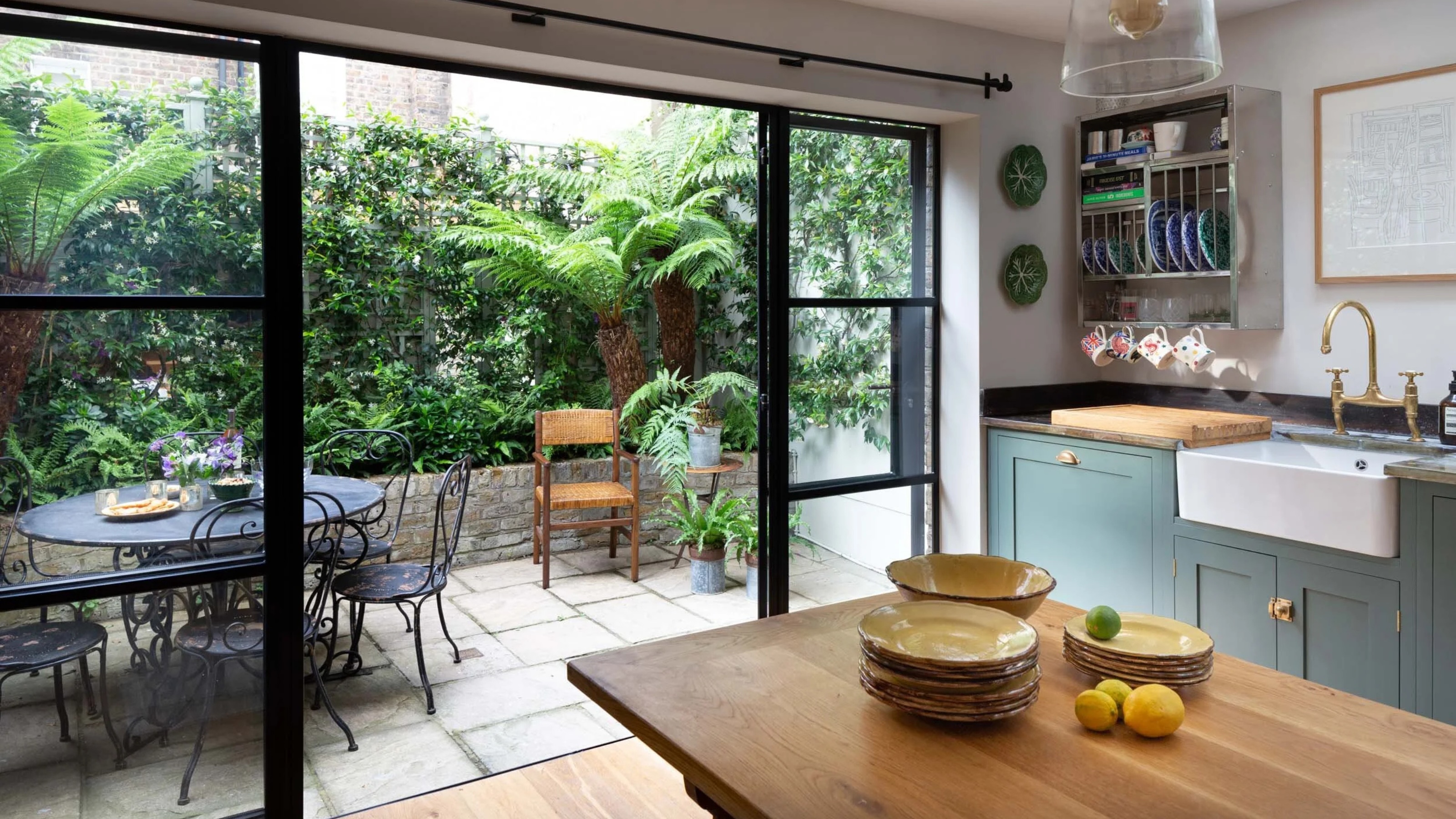 courtyard with antique vintage outdoor dining table 