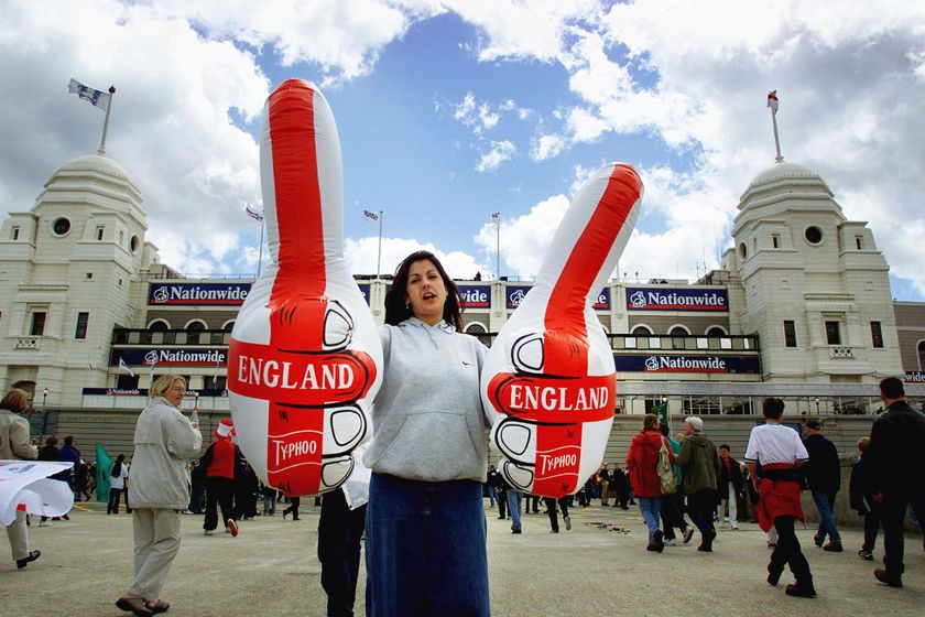 An England fan with inflatable thumbs at Wembley Stadium, 2000