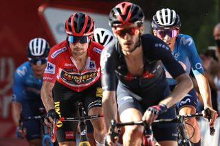 Overall leader Team Jumbos Slovenian rider Primoz Roglic 2L crosses the finish during the 7th stage of the 2021 La Vuelta cycling tour of Spain a 152 km race from Gandia to Balcon de Alicante in Tibi on August 20 2021 Photo by JOSE JORDAN AFP Photo by JOSE JORDANAFP via Getty Images