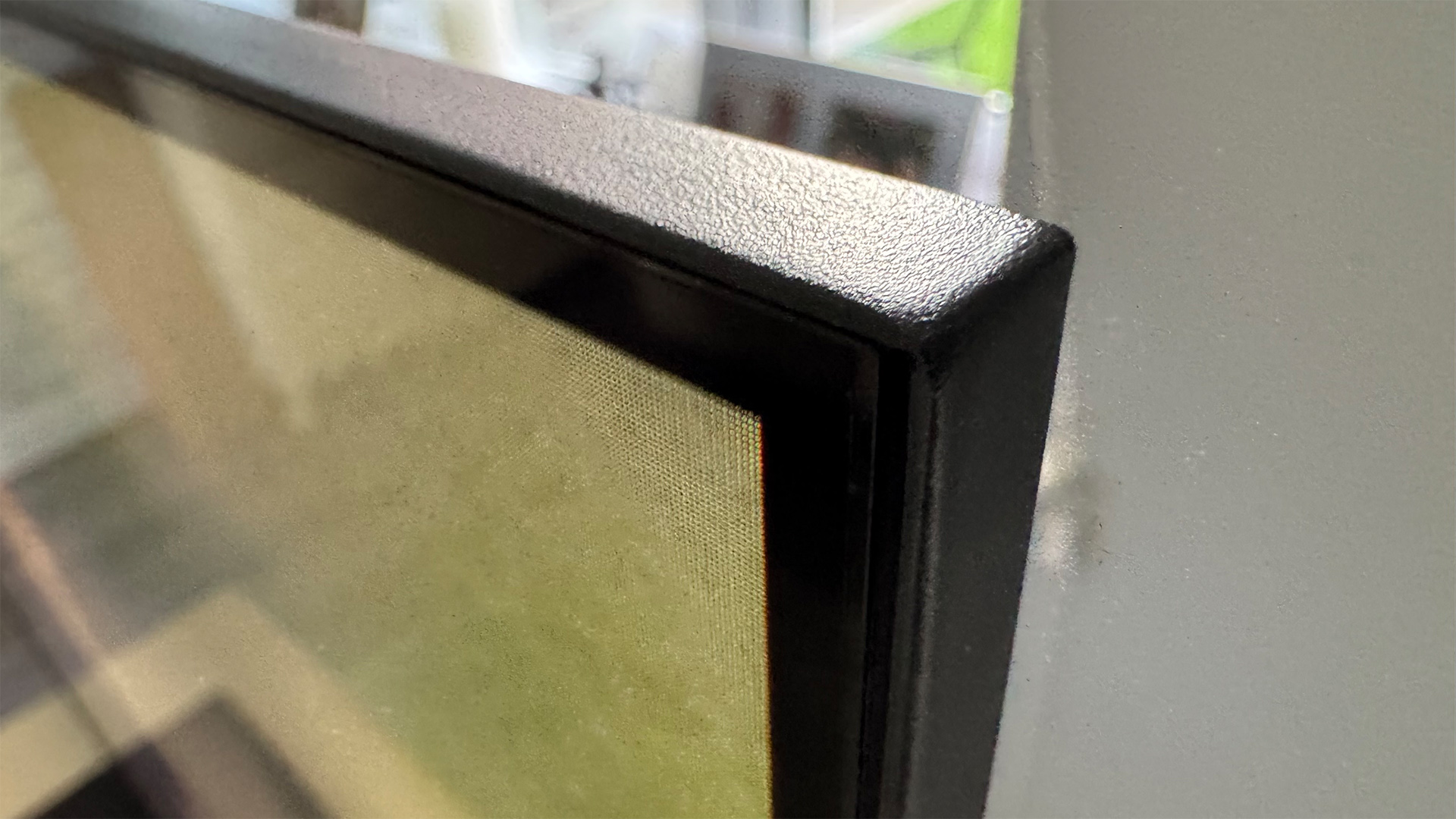 Hisense U7Q Pro Mini LED TV close up on top right corner of TV set