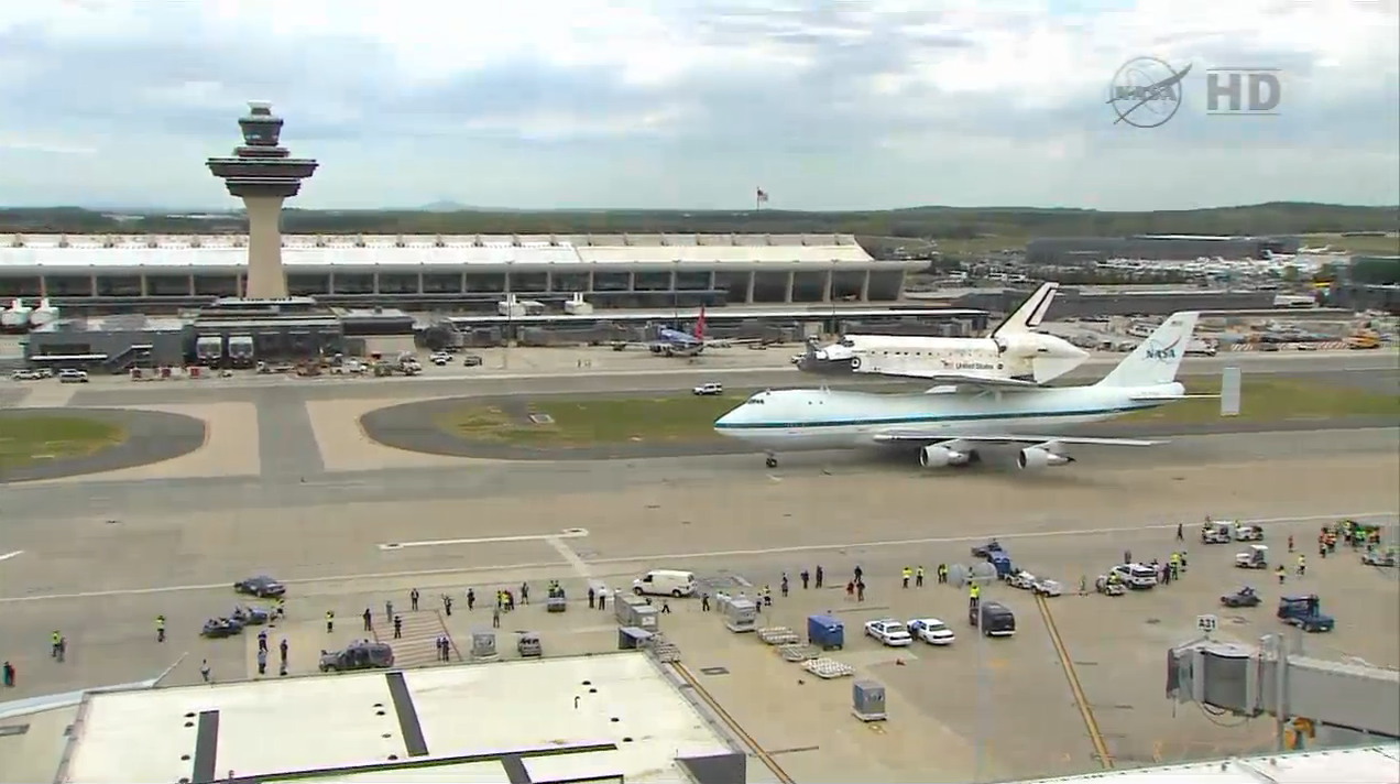 Shuttle Carrier Aircraft Carrying Discovery Taxis After Arriving