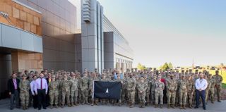 SPACE FLAG 22-3 participants pose for a group photo at Schriever Space Force Base, Colorado, Aug. 8, 2022.