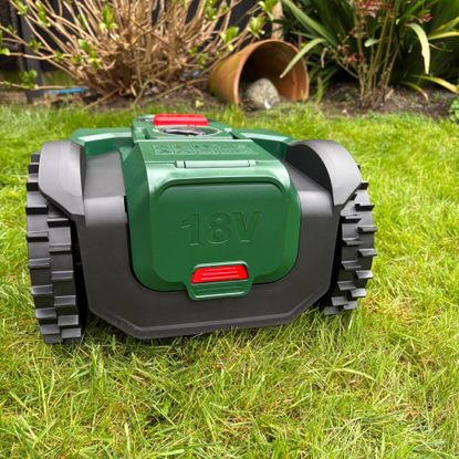 Back view of Bosch VISIMOW18V-100 Robot Lawn Mower battery compartment