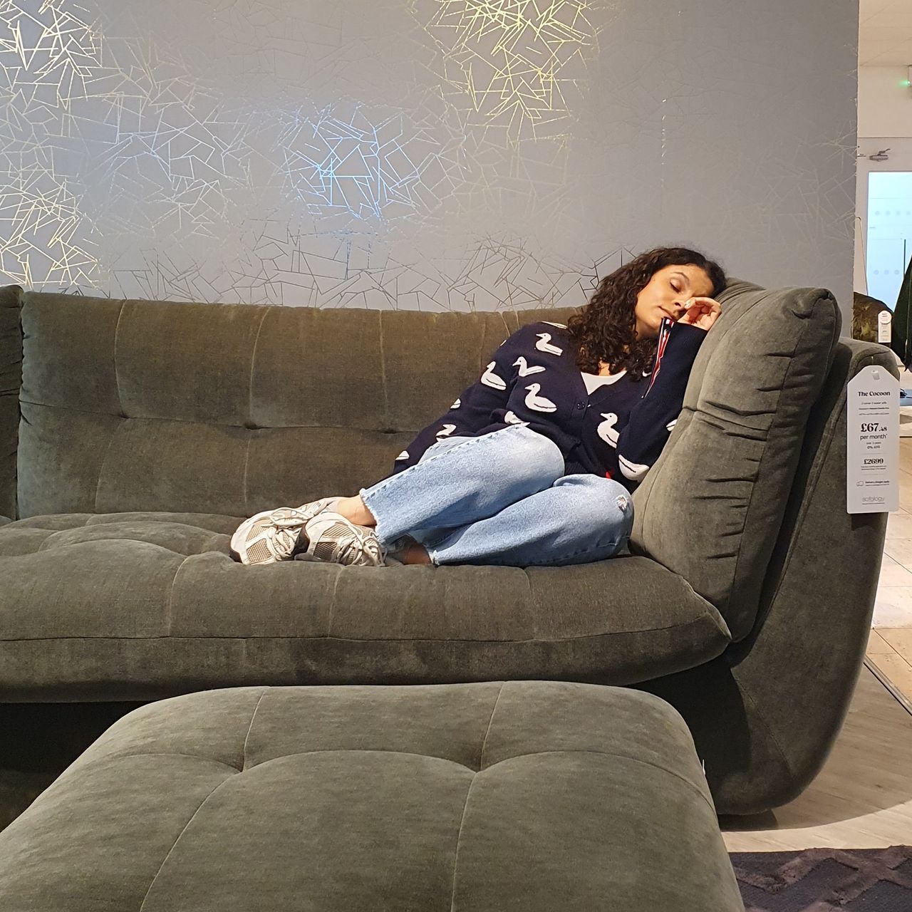Ideal Home's Content Editor, Sara Hesikova testing Sofology's Cocoon sofa