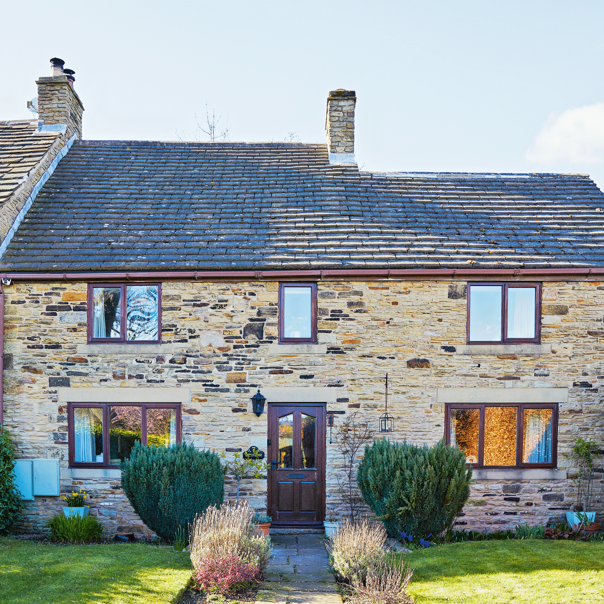 the exterior of a cottage-style house