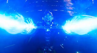 A screenshot from Ant-Man and the Wasp: Quantumania showing Kang the Conquerer blasting energy out of his hands