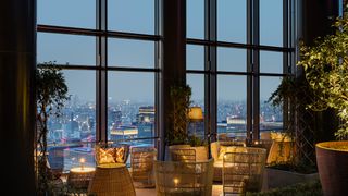 Bulgari Hotel Tokyo bar with city views in the evening
