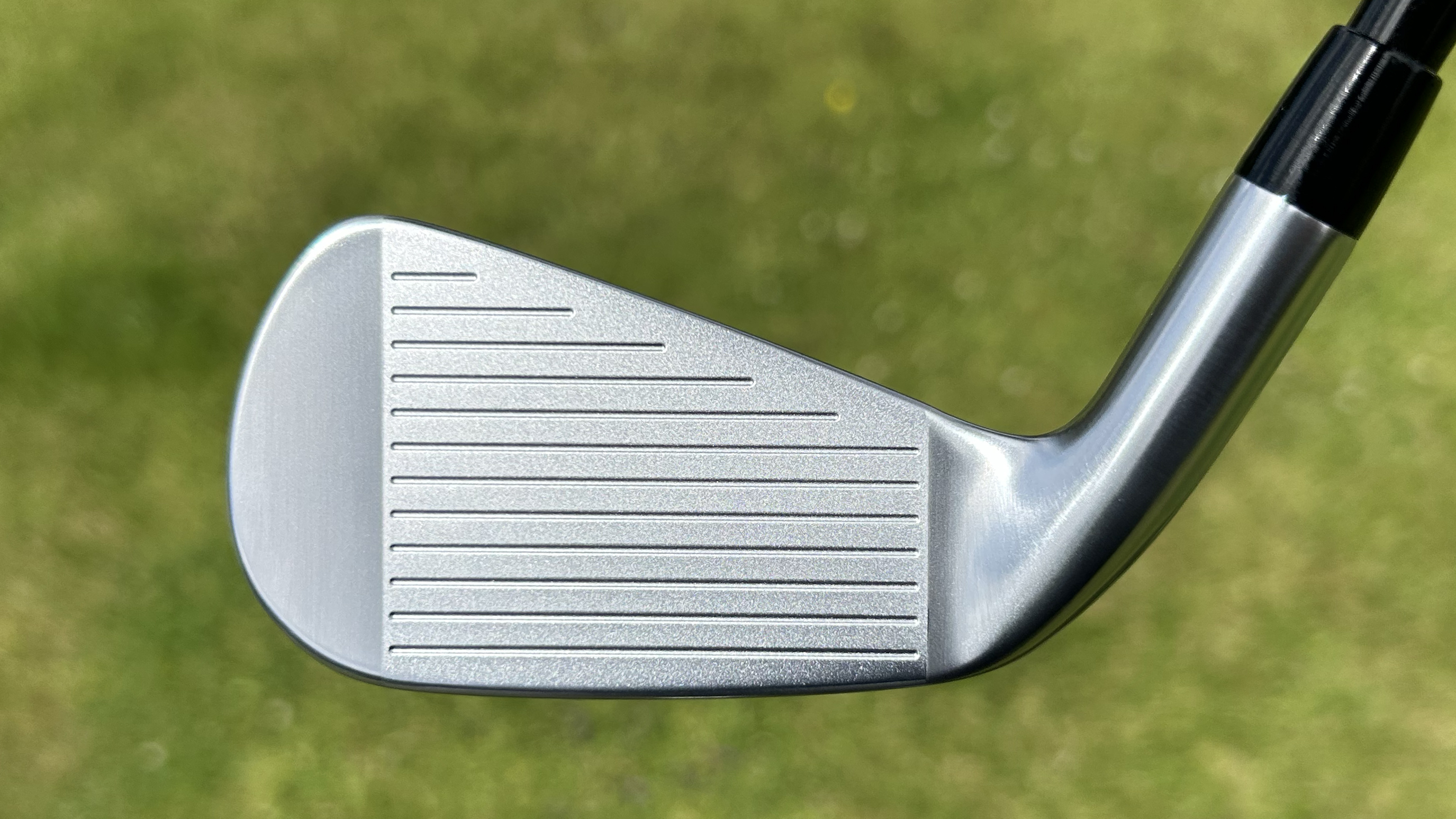 Photo of the Titleist T250U Utility Iron face