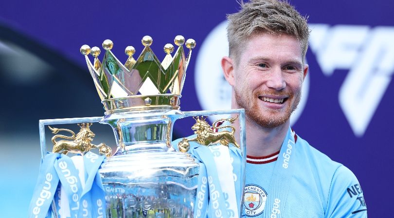 Manchester City midfielder Kevin De Bruyne celebrates with the Premier League trophy in May 2023.
