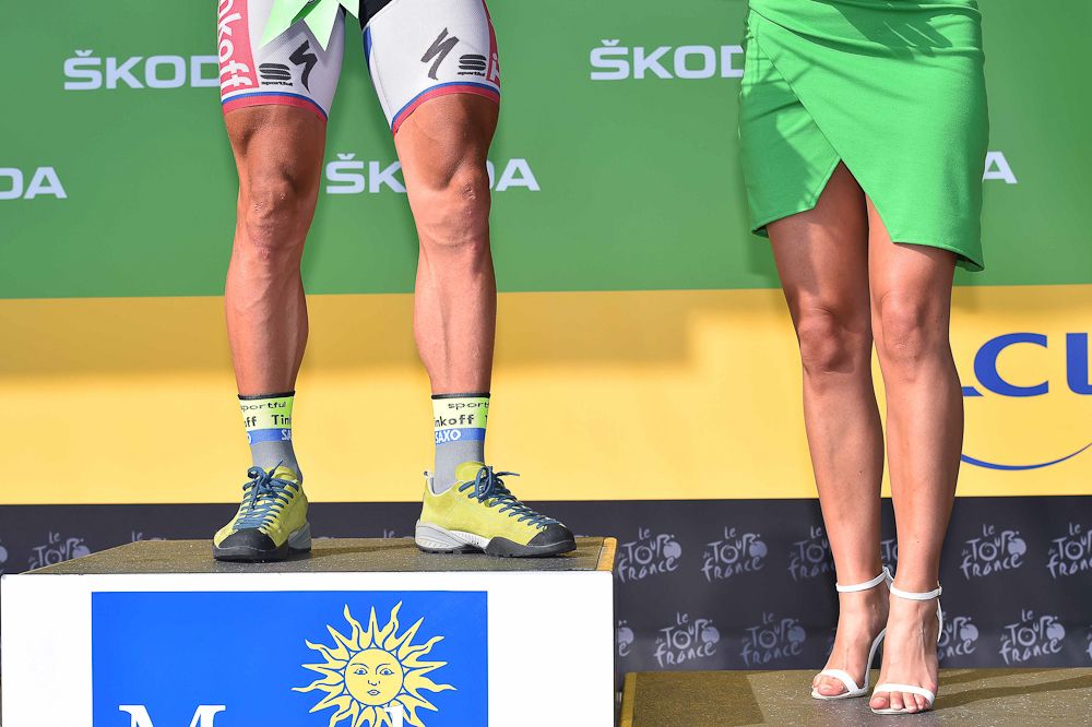 A comparison of legs on the stage 14 podium.