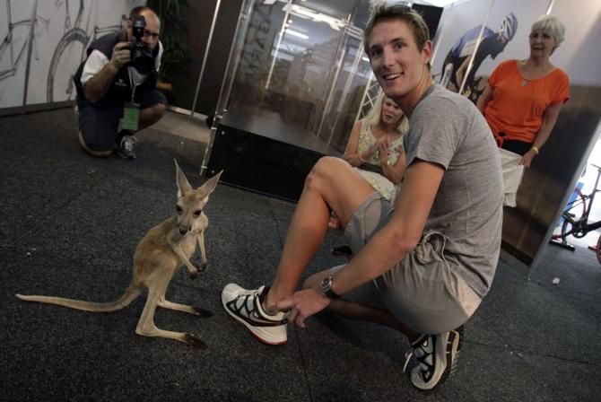 Andy Schleck takes time out with a new found friend