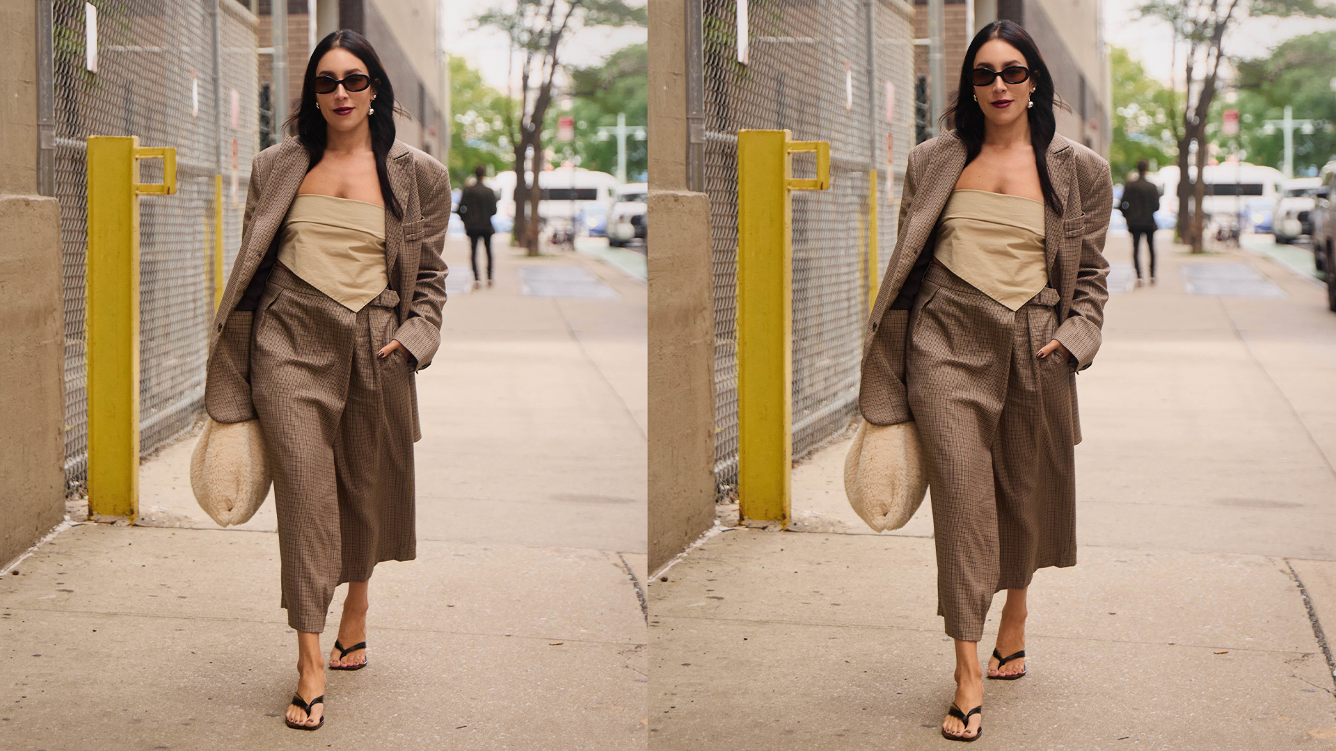 Lauren wears plaid suit, tube top, heels, and white textured handbag while walking and posing. 