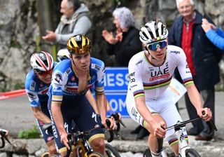 Remco Evenepoel tries to control Tadej Pogačar at Il Lombardia