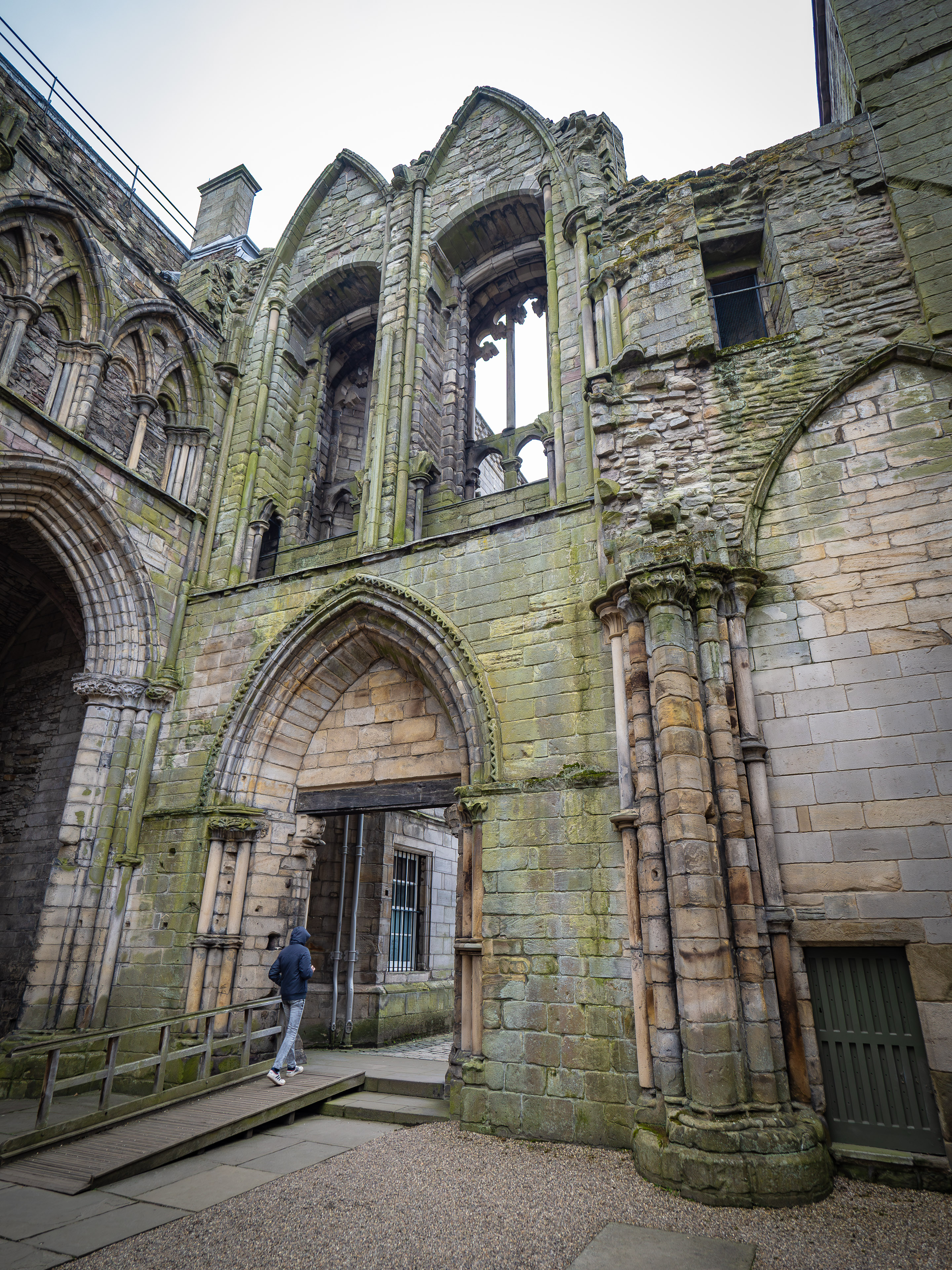 Screens and photos from a video game depicting Edinburgh