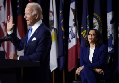 Biden introduces Kamala Harris as his running mate.