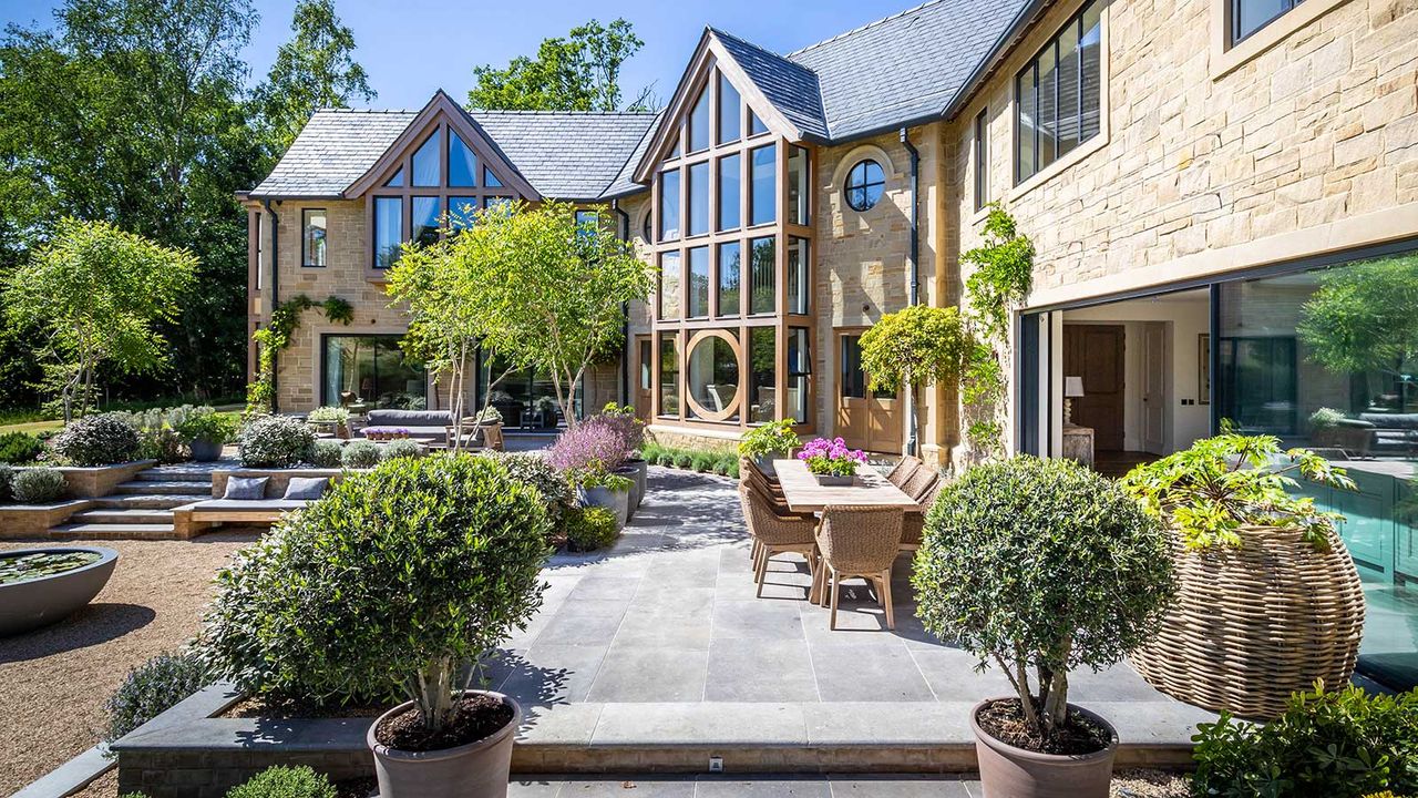 paved patio with plants