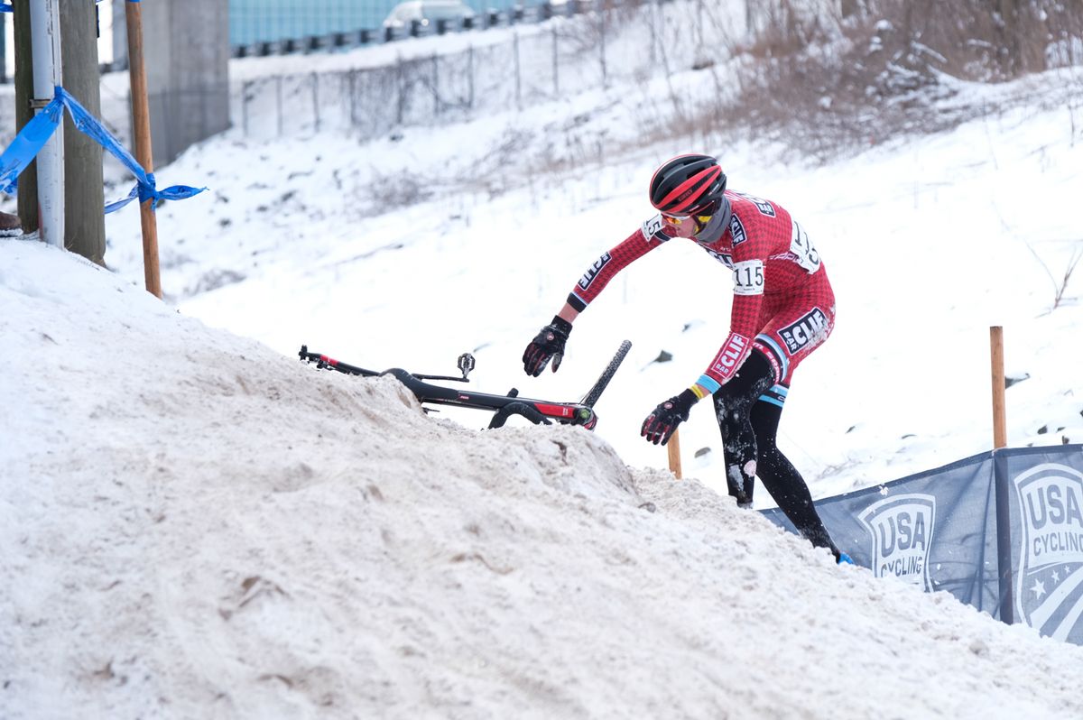 Anders Nystrom (Cliff Bar) retrieves his bike after falling on an icy off-camber hillside