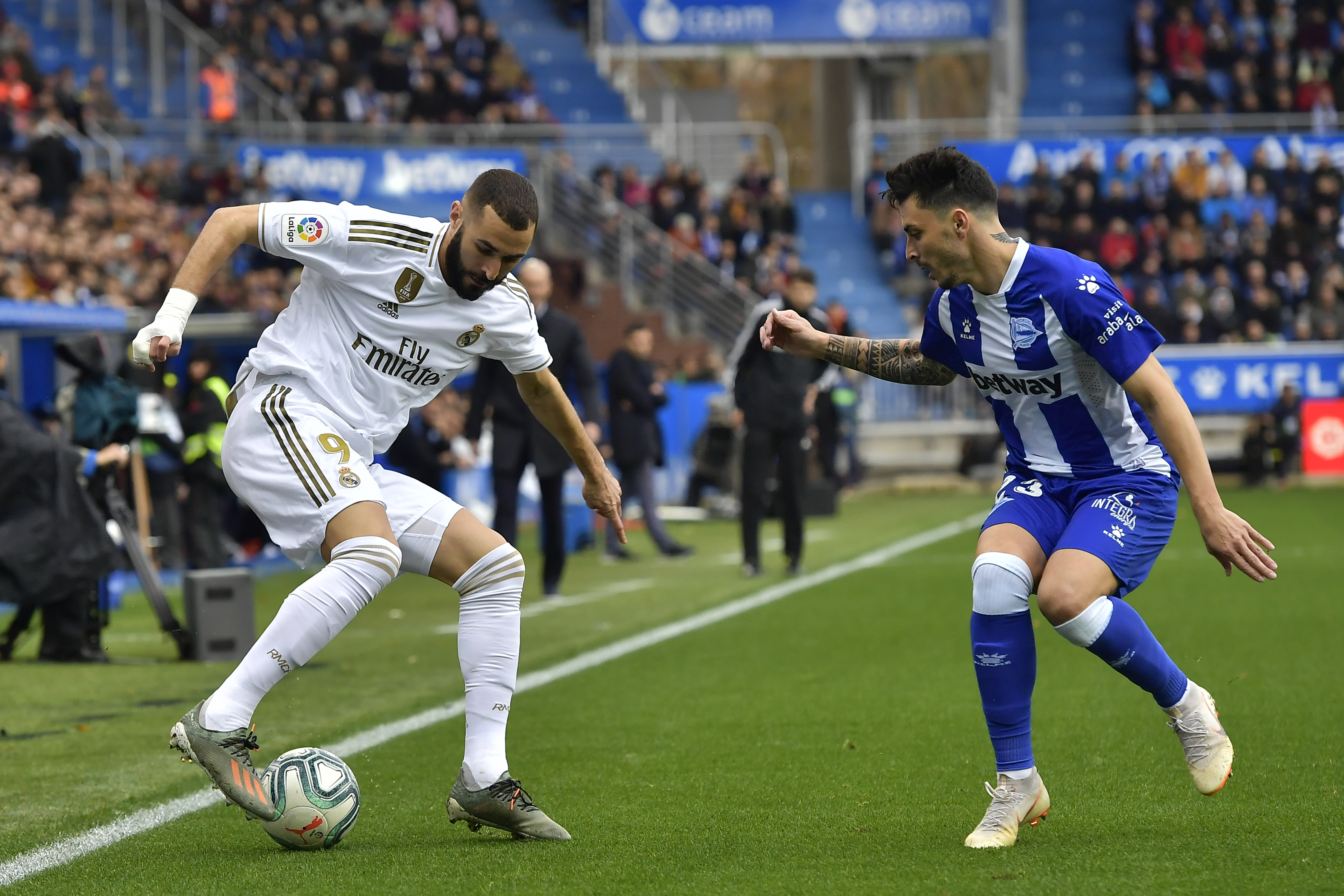 Real Madrid forward Karim Benzema (left)