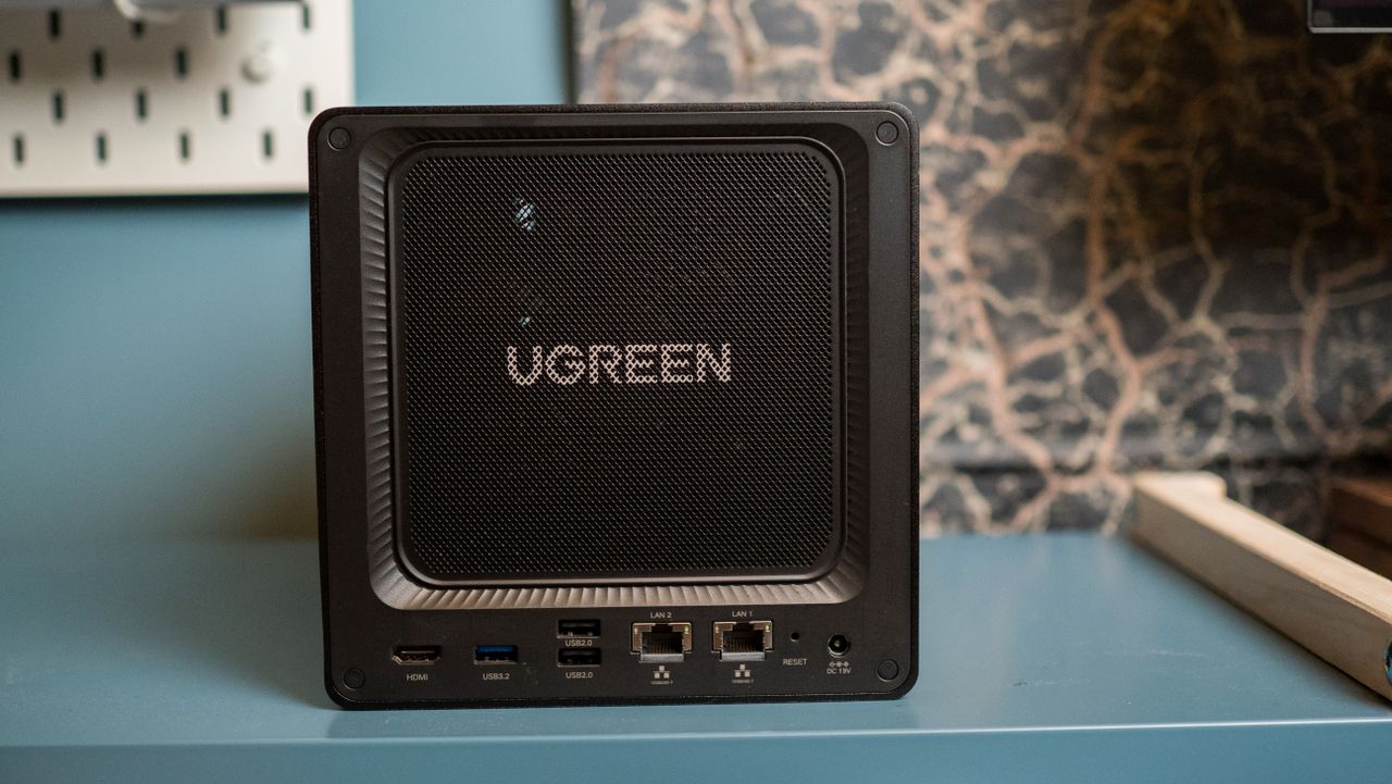 UGREEN DXP4800 GT 4-bay NAS on an IKEA shelf showcasing the ports on the rear