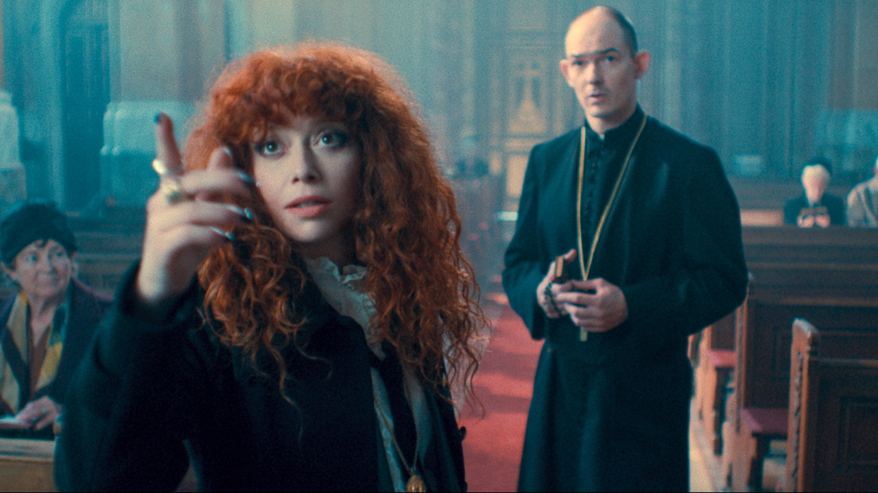 Natasha Lyonne and Ákos Orosz talking in church in Russian Doll.