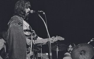 The Byrds’ Clarence White (left) and Gene Parsons (on drums) perform in Flushing, New York, in February 1970; White’s Telecaster is now owned by Marty Stuart.