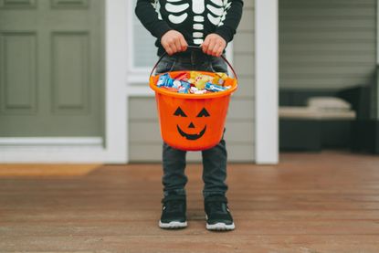 trick or treating bucket with sweets