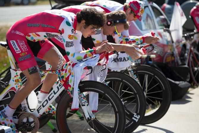 The Jelly Belly squad warm up before the time trial start.