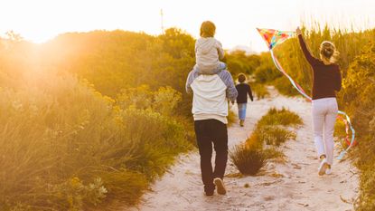 Family walking in the sunshine 