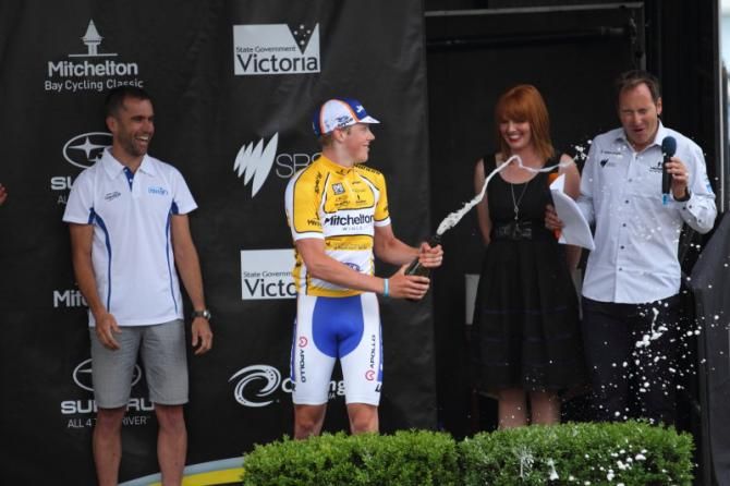 Alexander Morgan (Team Jayco-VIS) sprays commentator and also his coach, Scott McGrory during the presentations