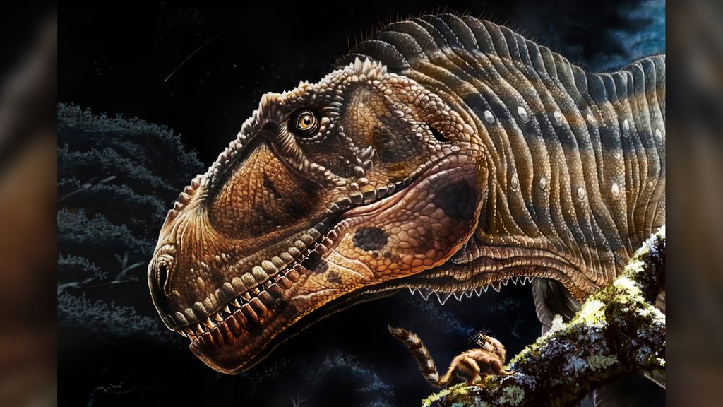 Giant meat-eating dinosaur had a fancy skull and wee arms like T. rex ...