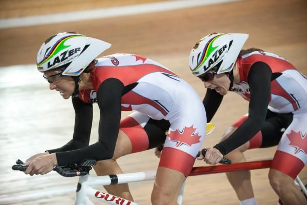 Former road racer Lyne Bessette and Robbi Weldon ride the tandem for Canada.