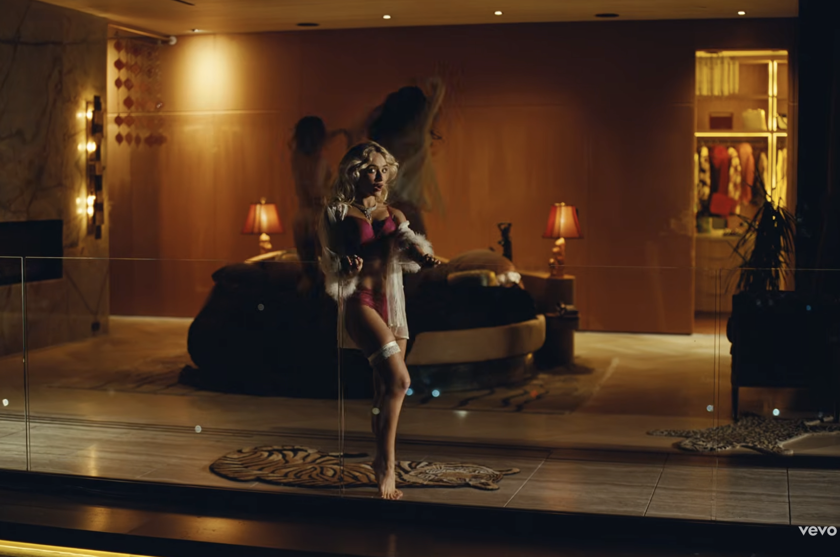 Sabrina Carpenter wore lingerie-inspired looks in the "House Tour" music video