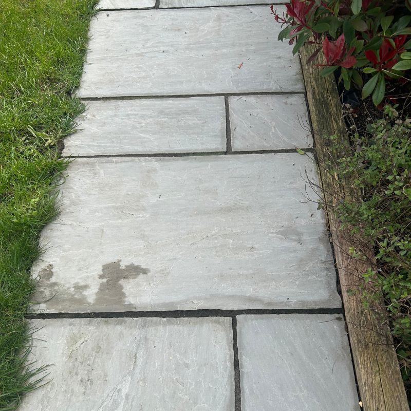 Clean patio after pressure washing