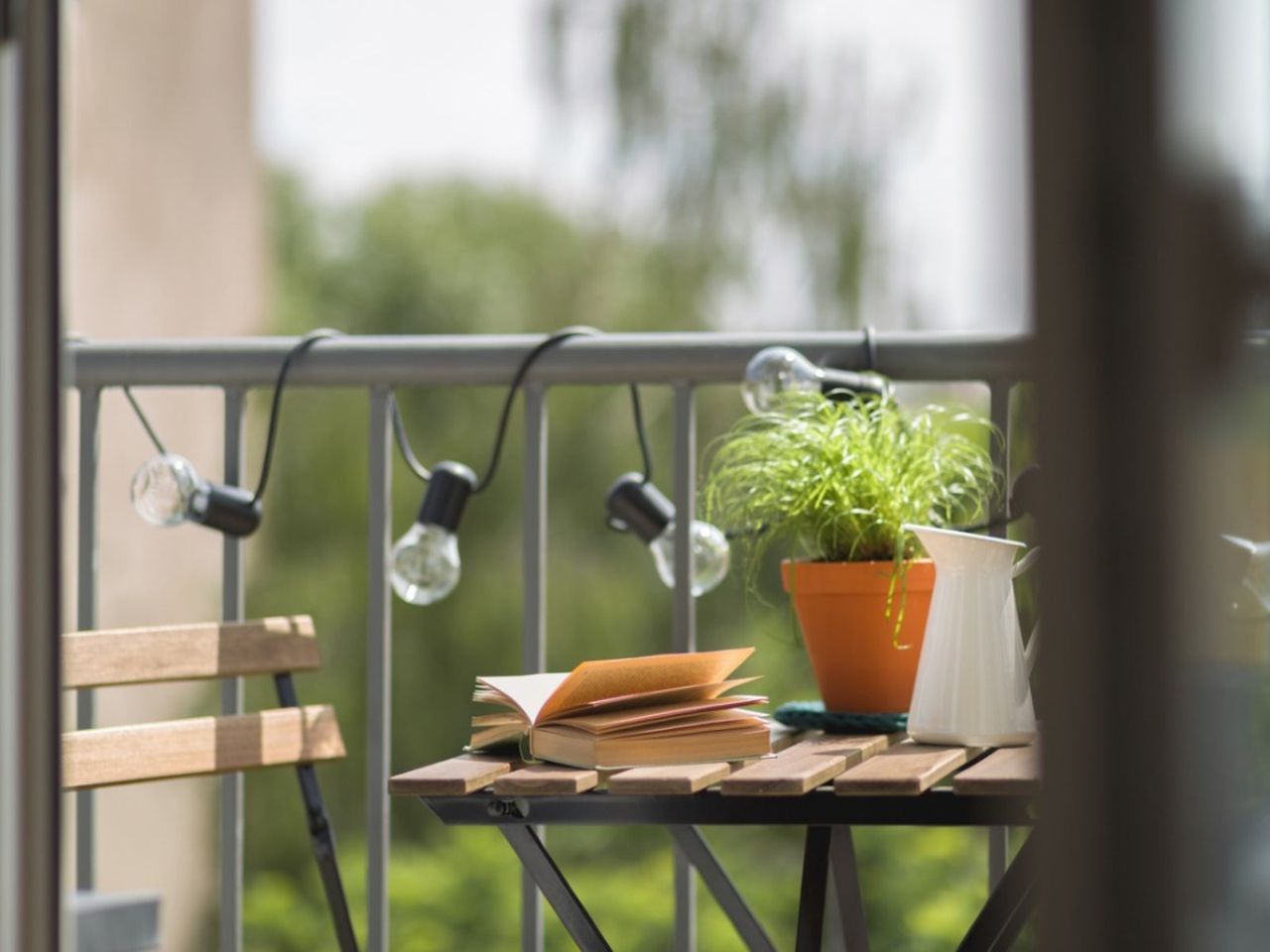 Balcony Space With Furniture And Potted Plant