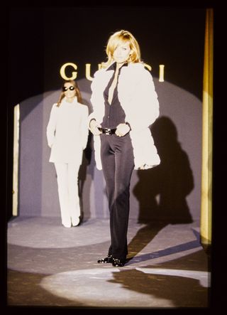 ITALY - AUGUST 01: Model walks Gucci's RTW (pret a porter) Fall 1995 Runway collection designed by Tom Ford.