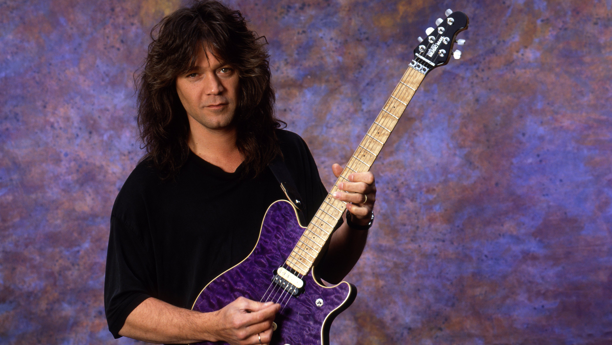 Eddie Van Halen at a photo session with his Music Man electric guitar for Guitar Magazine in 1991 in Los Angeles