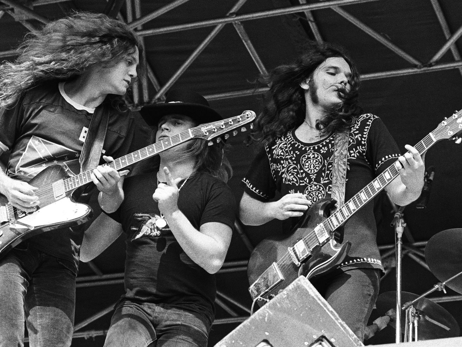 Lynyrd Skynyrd performing in their pre-crash concert era. Archive photograph reproduced by Guitar World; not a photograph of the final Greenville show.