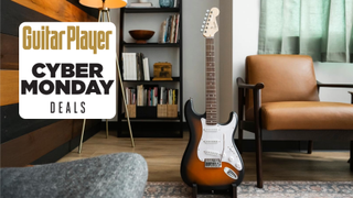 A Squier Debut Stratocaster on a stand in a living room