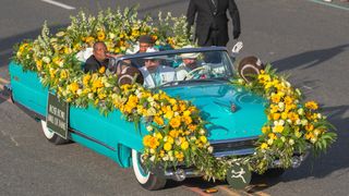 PASADENA, CA - JANUARY 2: The Rose Bowl Hall of Fame blue Caddy travels down Colorado Blvd. in front of spectators ahead of the 136th Tournament of Roses Parade 2025 on New Year&#039;s Day 