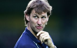 WYCOMBE, ENGLAND - JULY 20: Wycombe manager Tony Adams looks on during the Pre Season Friendly match between Wycombe Wanderers and Portsmouth at the Causeway Stadium on July 20, 2004 in Wycombe, England. (Photo by Shaun Botterill/Getty Images)